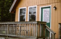 Outdoor angled view of a camping cottage at rock mountain.