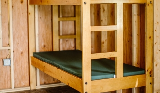 View inside junior campers bunk.